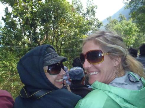 Forcing smiles on top of a bus as we contemplate our potentially fatal ride.
